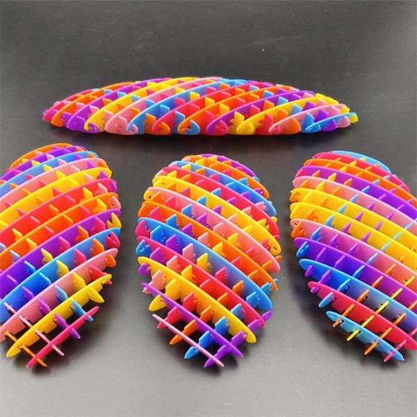 Anti-stress leksak sensorisk regnbåge i flexibel plast 10x8 cm