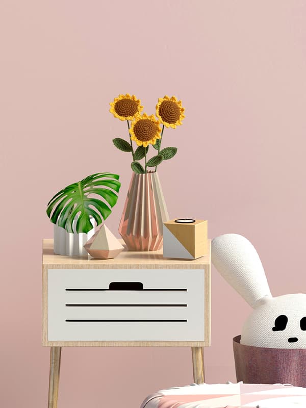 Handstickad bukett av simulerade virkade ullblommor, små prästkragar