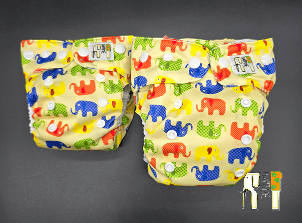 NappiMe Mini Pocket vaskbare microfleecebleer med farverige elefanter.