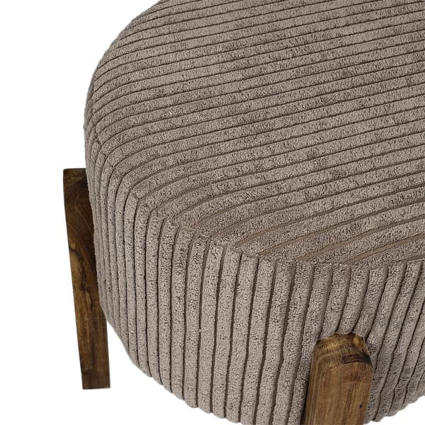 Modern taupefärgad klädd puff