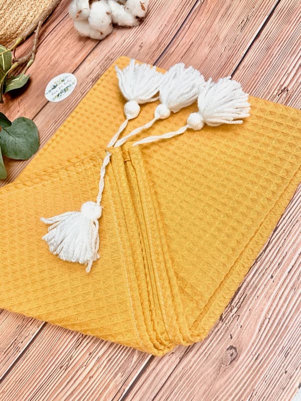 Koc / kocyk wafelek 75x100 Boho samling senapspomponger