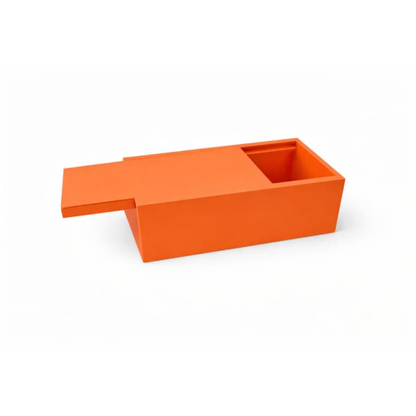 Orange organizer-boks med skydelåg til småting