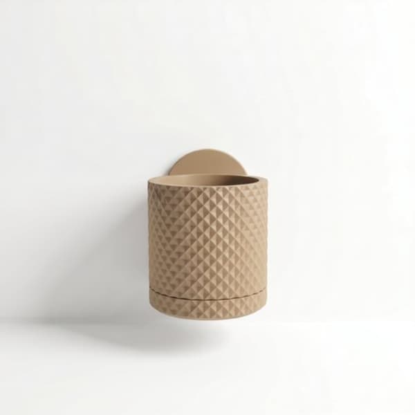 Beige blomkruka med diamantmönster och dold droppbricka