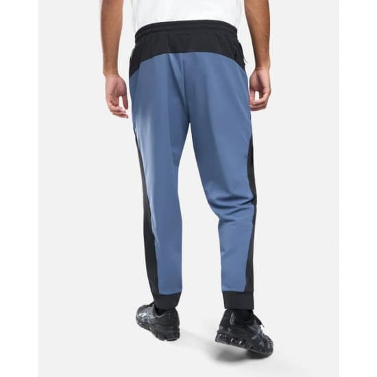 Puma Tech Woven -housut musteensiniset [680311 55] koko S