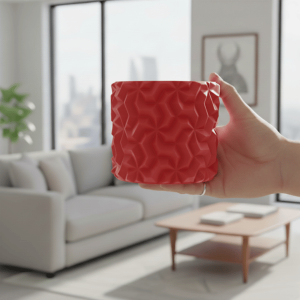 Rød urtepotteskjuler med 3D geometrisk mønster til loftplanter