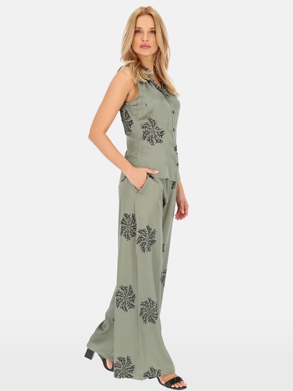 ELEGANT ÄRMLÖS DAMBLUS MED PALJETTER