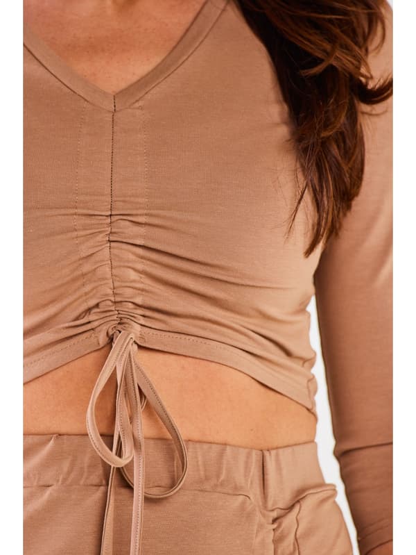 Figursydd blus med ¾ ärmar och V-ringning, beige M