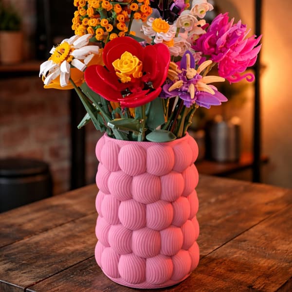 Dekorativ rosa vas, strukturerad, modern designskulptur