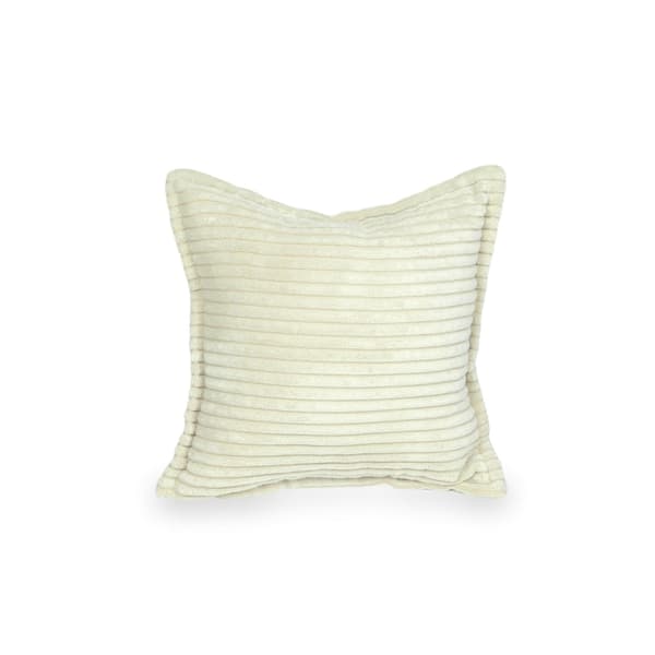 Pieni beige sametti sohvatyyny