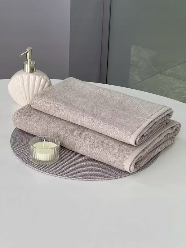 2x beige badhanddukar i bomull 70x140 50x90