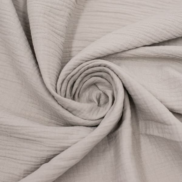 Bomuldsmuslin, lys beige farve