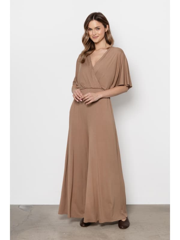 Beige jumpsuit med vida ben M