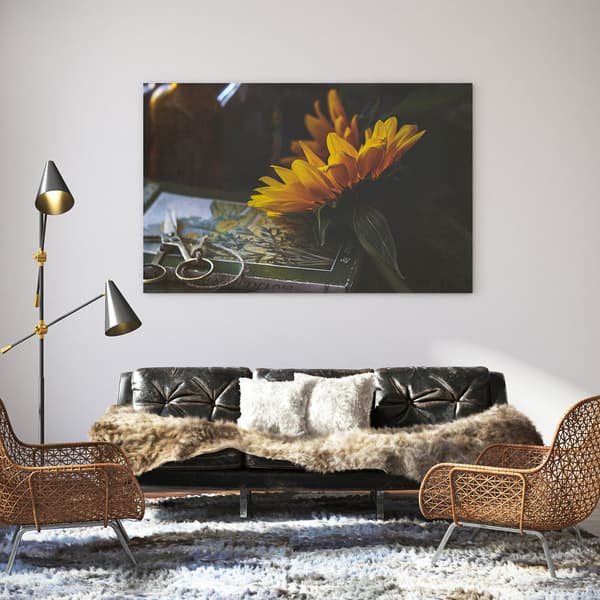 Canvastavla Solros och bok 80x50 cm