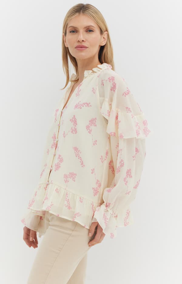 Blommig blus med volanger M