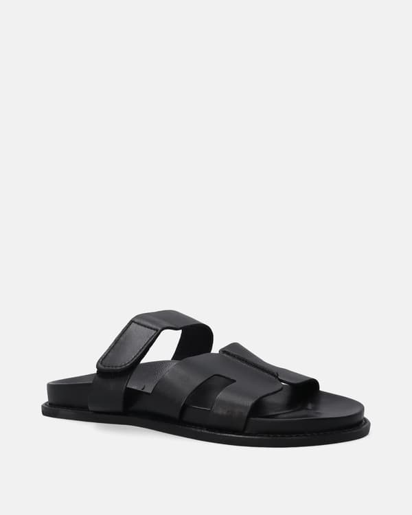 Sorte læderklipklapper med velcro Sorte læderklipklapper med velcro 37