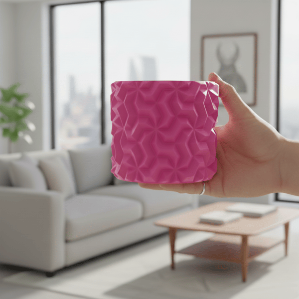 Lyserødt urtepotteskjuler med 3D geometrisk mønster til loftplanter