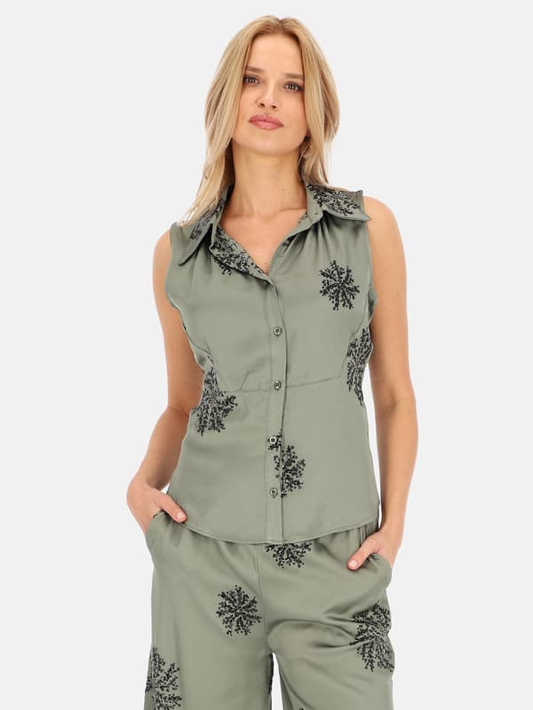 ELEGANT ÄRMLÖS DAMBLUS MED PALJETTER