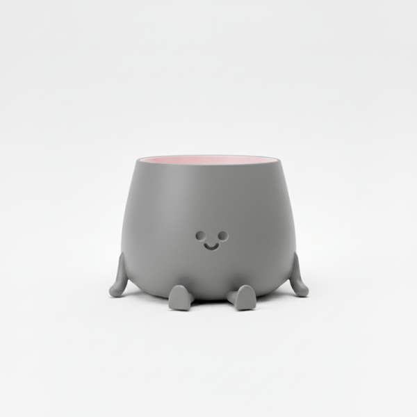 Dekorativ urtepotte med et smil, grå, til planter, moderne design