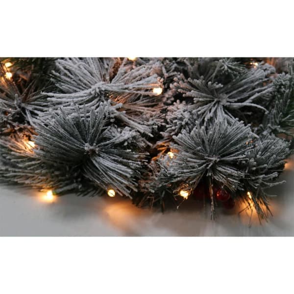 Julekrans med LED-lys og den første sne-effekt
