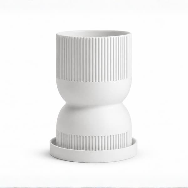 Hvid timeglasblomsterpotte med moderne underkop