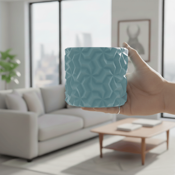 Blå urtepotteskjuler med 3D geometrisk mønster til loftplanter