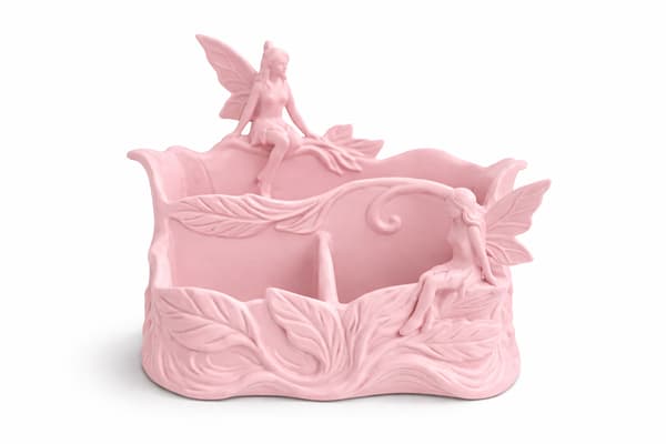 Rosa skrivbordsarrangör med älvmotiv