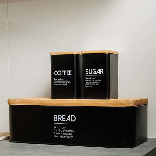 Svart metallbehållare för kaffe