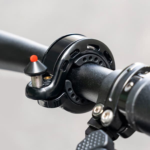 Q-formad cykelringklocka 100db - svart