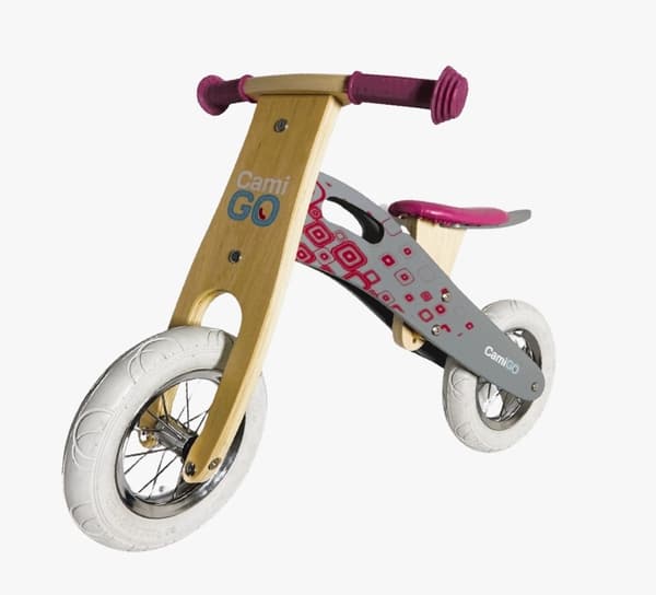 lyserød løbecykel