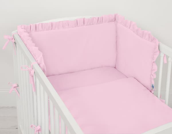 Universal spjälsängsskydd med volang - rosa