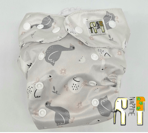 NappiMe vaskbare bleer i gåsefarvet microfleece.