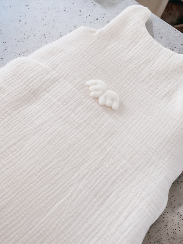 Isolerad muslinsovsäck för bebisar (latte angel)