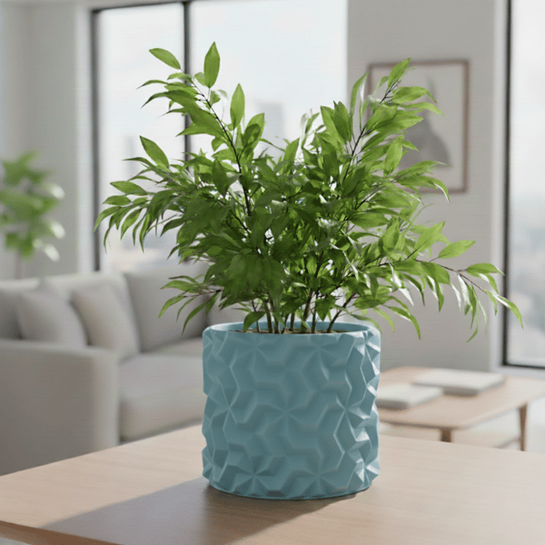 Blå urtepotteskjuler med 3D geometrisk mønster til loftplanter
