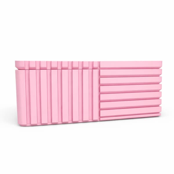 Lyserød rillet organizer-boks med låg til småting til kontoret
