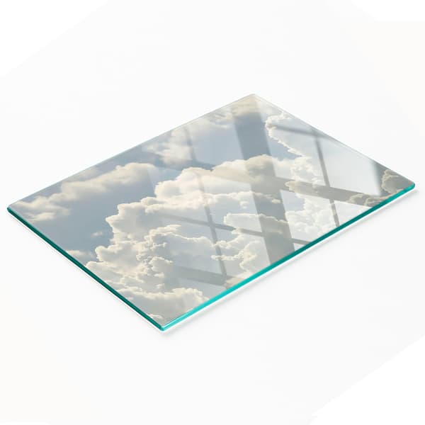Serveringsbräda i härdat glas med molngrafik 80x52 cm