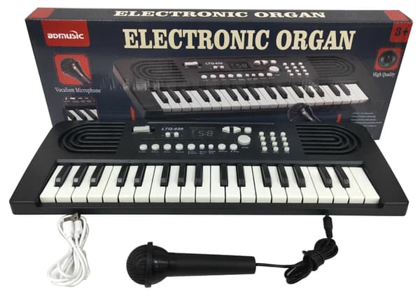 Stor orgel, keyboard med mikrofon