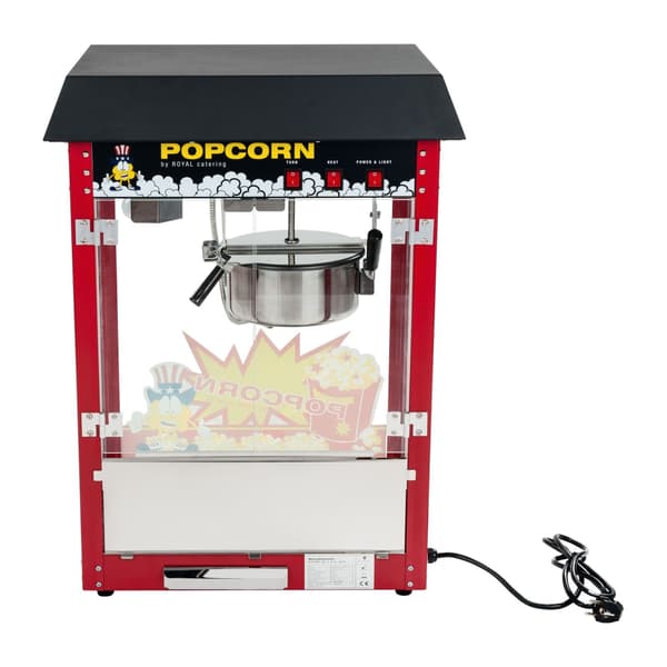 Baaripopcorn-kone mustalla päällä