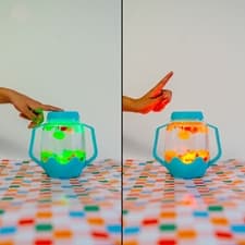 Glo Pals Vattenfylld Sensorisk Burk, Röd