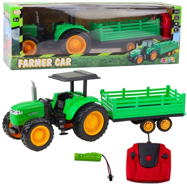 Grøn RC-traktor med trailer