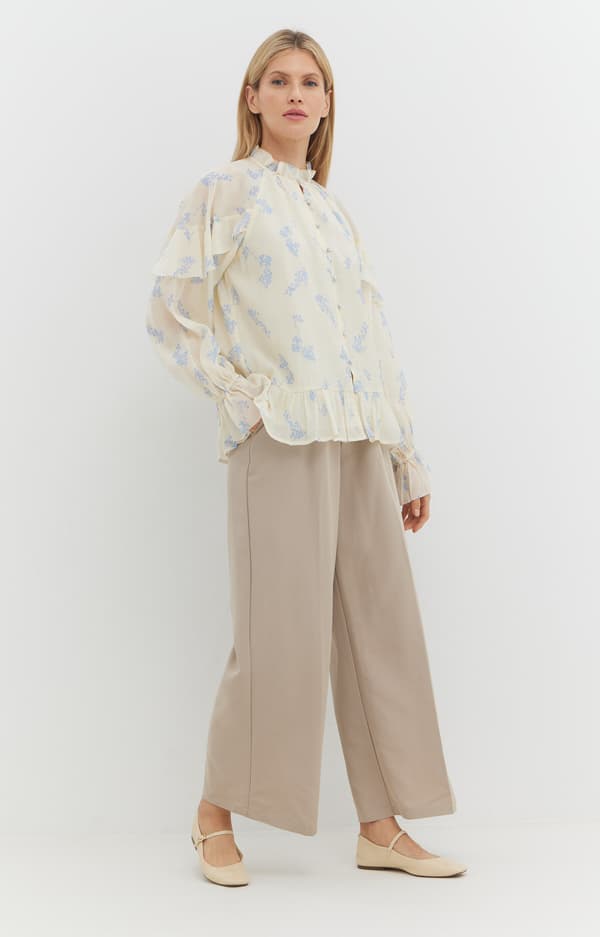 Blommig blus med volanger XS