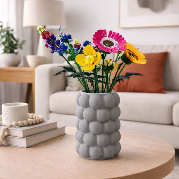 Dekorativ grå vas, strukturell, modern designskulptur