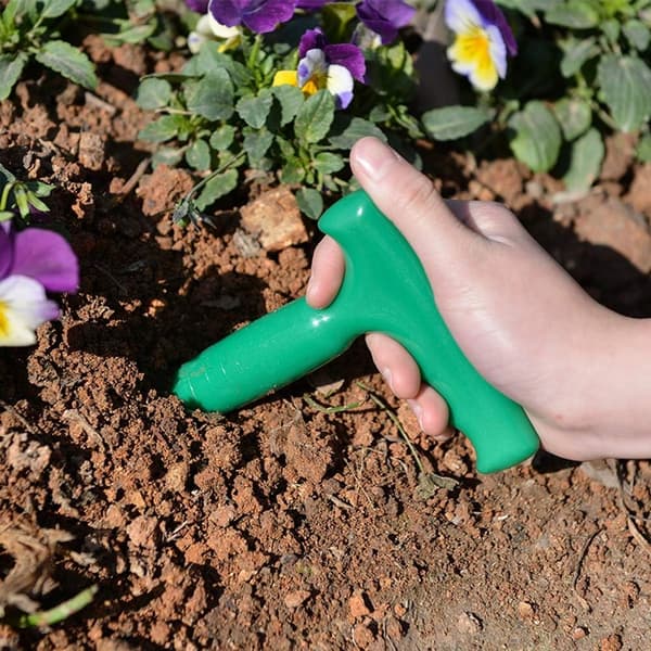 Trädgårdspenna för plantering av frön och lökar