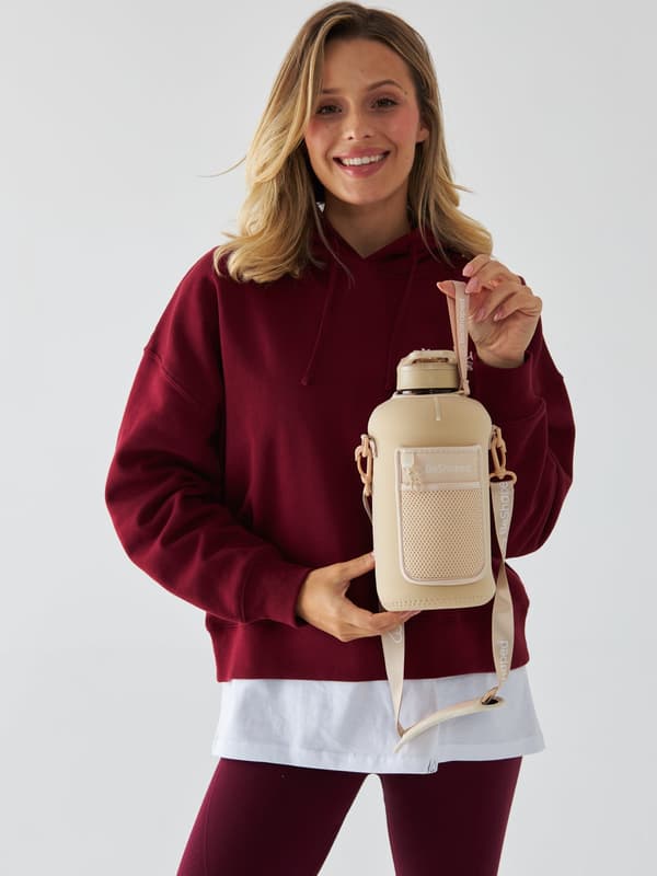 Beige vandflaske med lomme 2,2 l