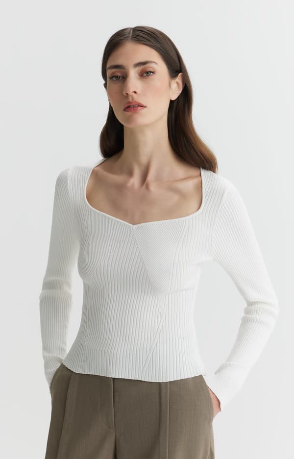 Stickad blus med manschett XL