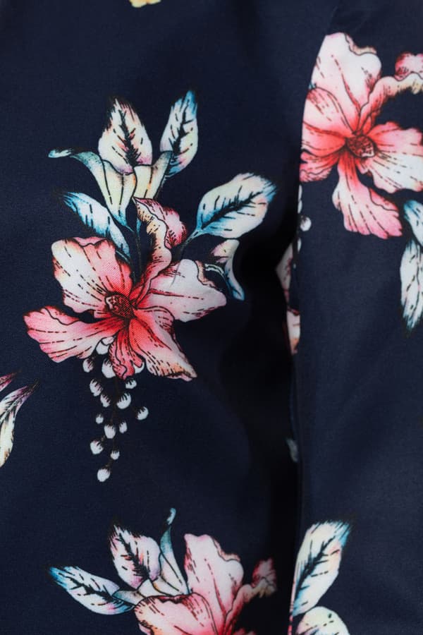 Kort marinblå blommig jacka 36