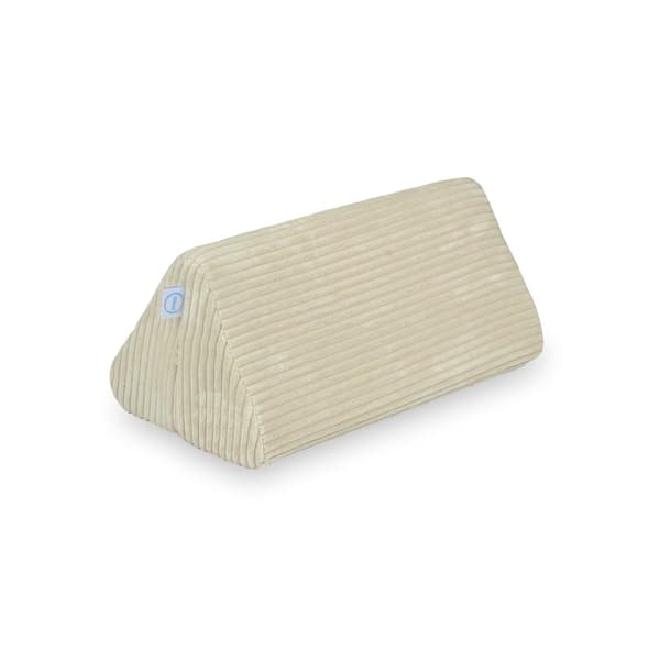 Lille trekant til den beige corduroy-sofa
