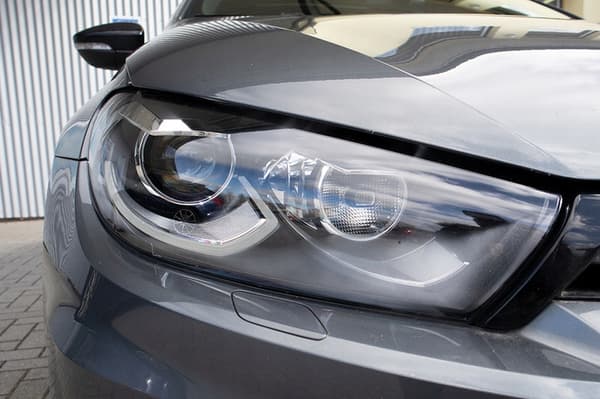 Vänster strålkastarskydd Volkswagen Scirocco III (2008 - 2017)