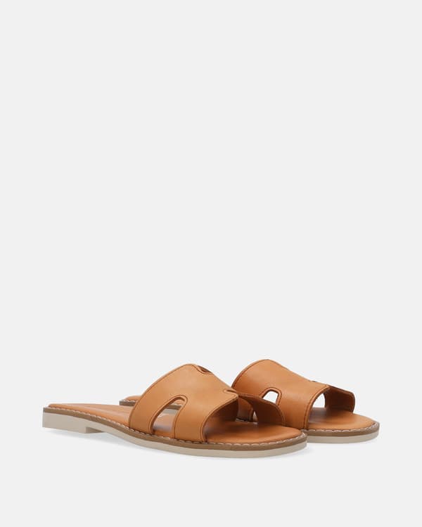Bruna läderflip-flops med utskärningar för dam Bruna läderflip-flops med utskärningar för dam 36
