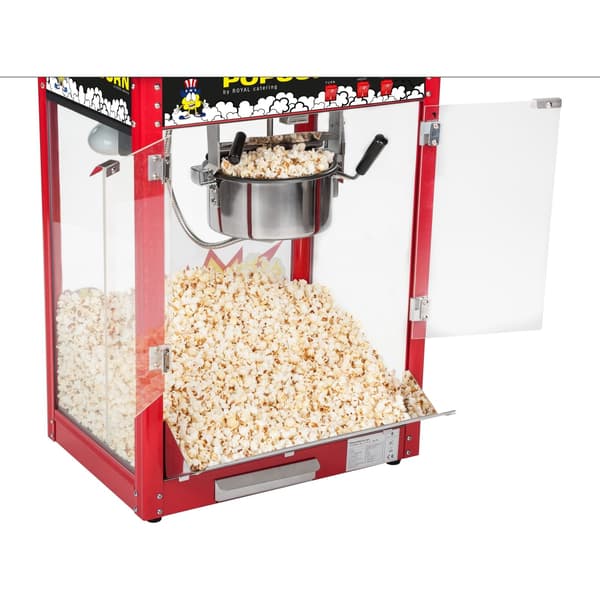 Baaripopcorn-kone mustalla päällä