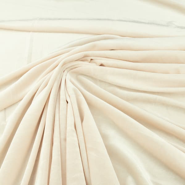 Velour stickad tyg cremefärgat 0,5m mjukt sytextil